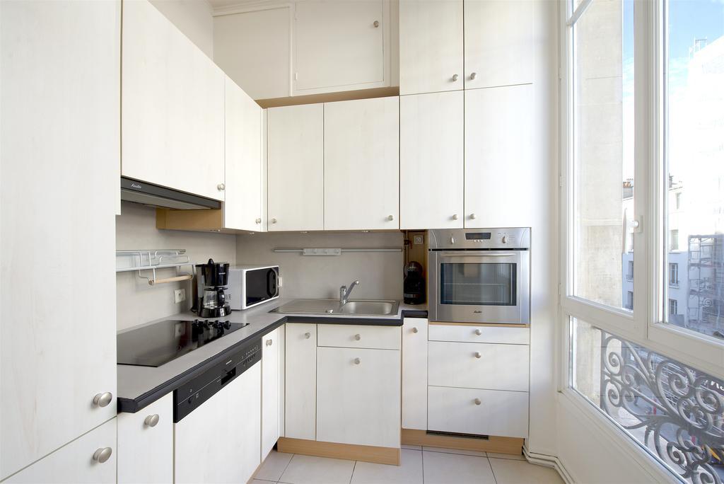Апартаменты Habitat Parisien - 1Br-1Ba - Galeries Lafayette Номер фото